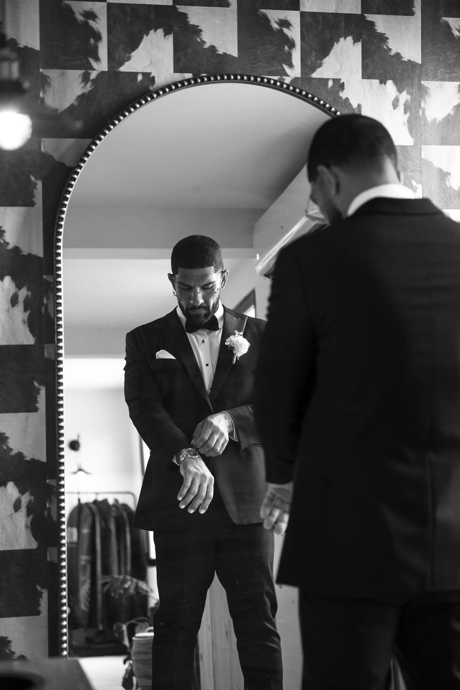 Groom and best man sharing a moment before the ceremony