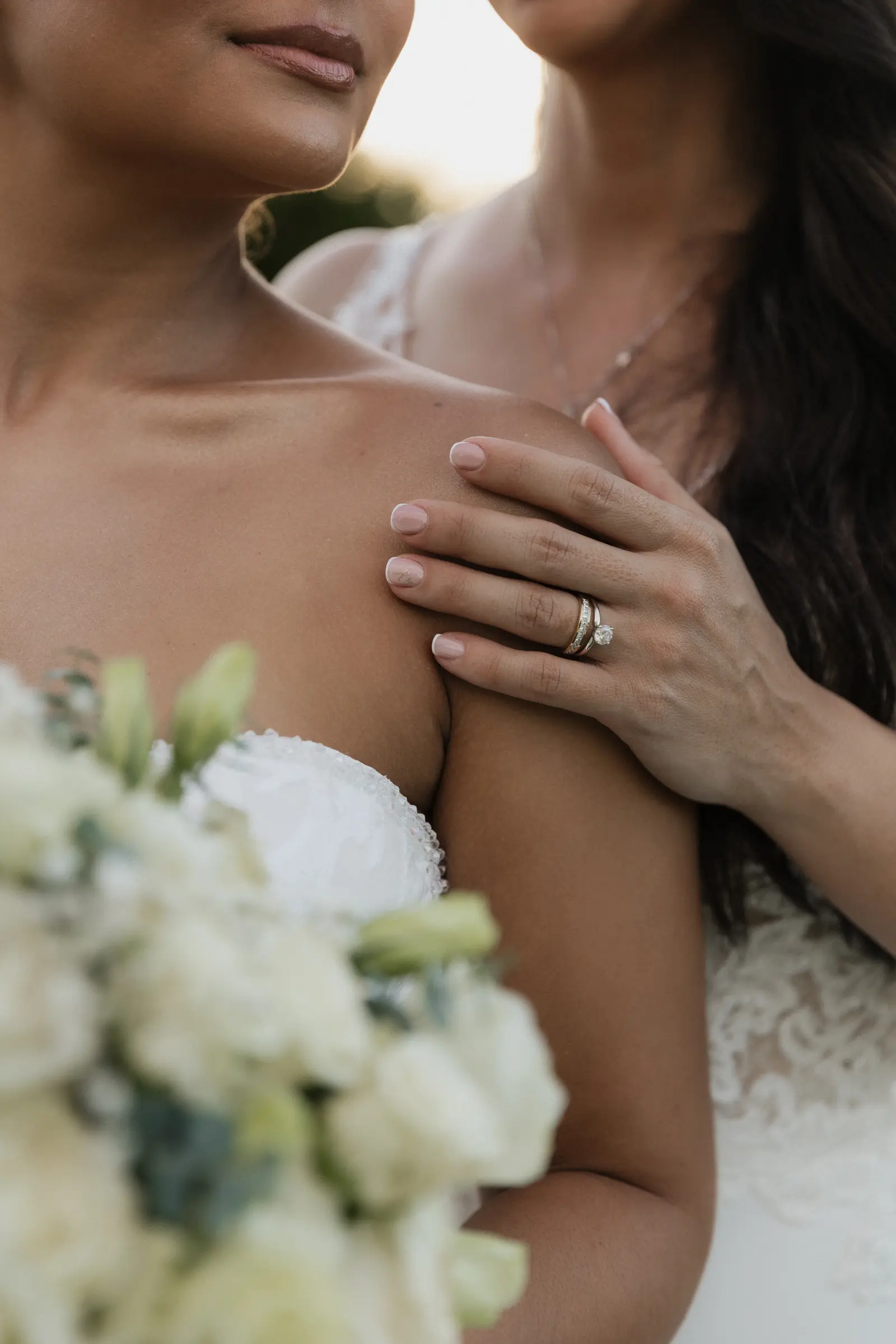 Close-up of the bride and groom embracing